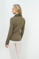 Side view of olive green button-up with collar.