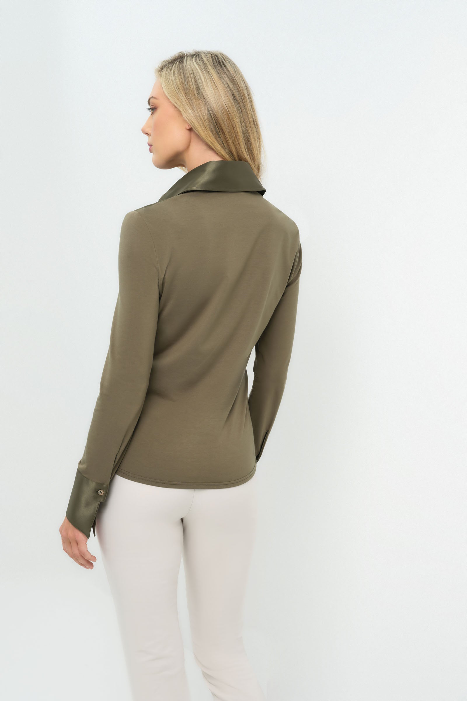 Side view of olive green button-up with collar.