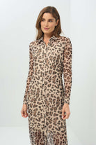 Detailed up-close shot of a sheer cheetah-print button-down dress featuring a classic collar, long sleeves, and a side slit for added movement. Made from lightweight fabric for an effortlessly chic look.