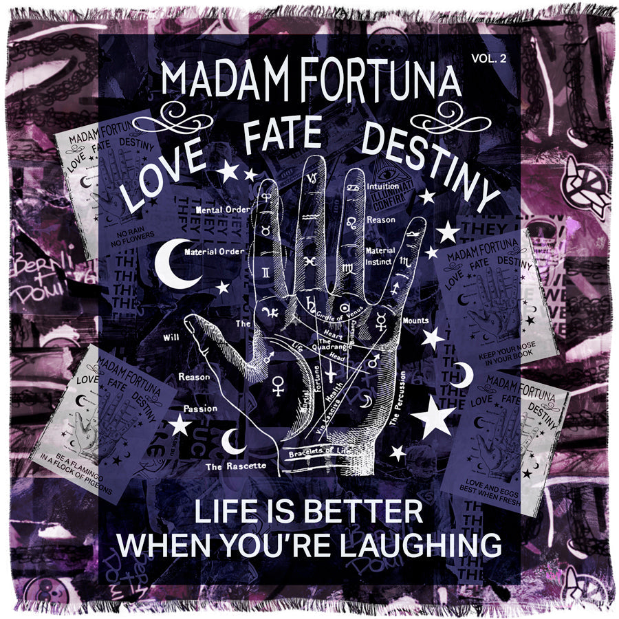 The Madame Fortuna Vol 2 tapestry by SUZI ROHER features a palmistry hand with words like “LOVE,” “FATE,” and “DESTINY,” mystical symbols, and text reading, “MADAM FORTUNA” and “LIFE IS BETTER WHEN YOU’RE LAUGHING” on a purple motif background.