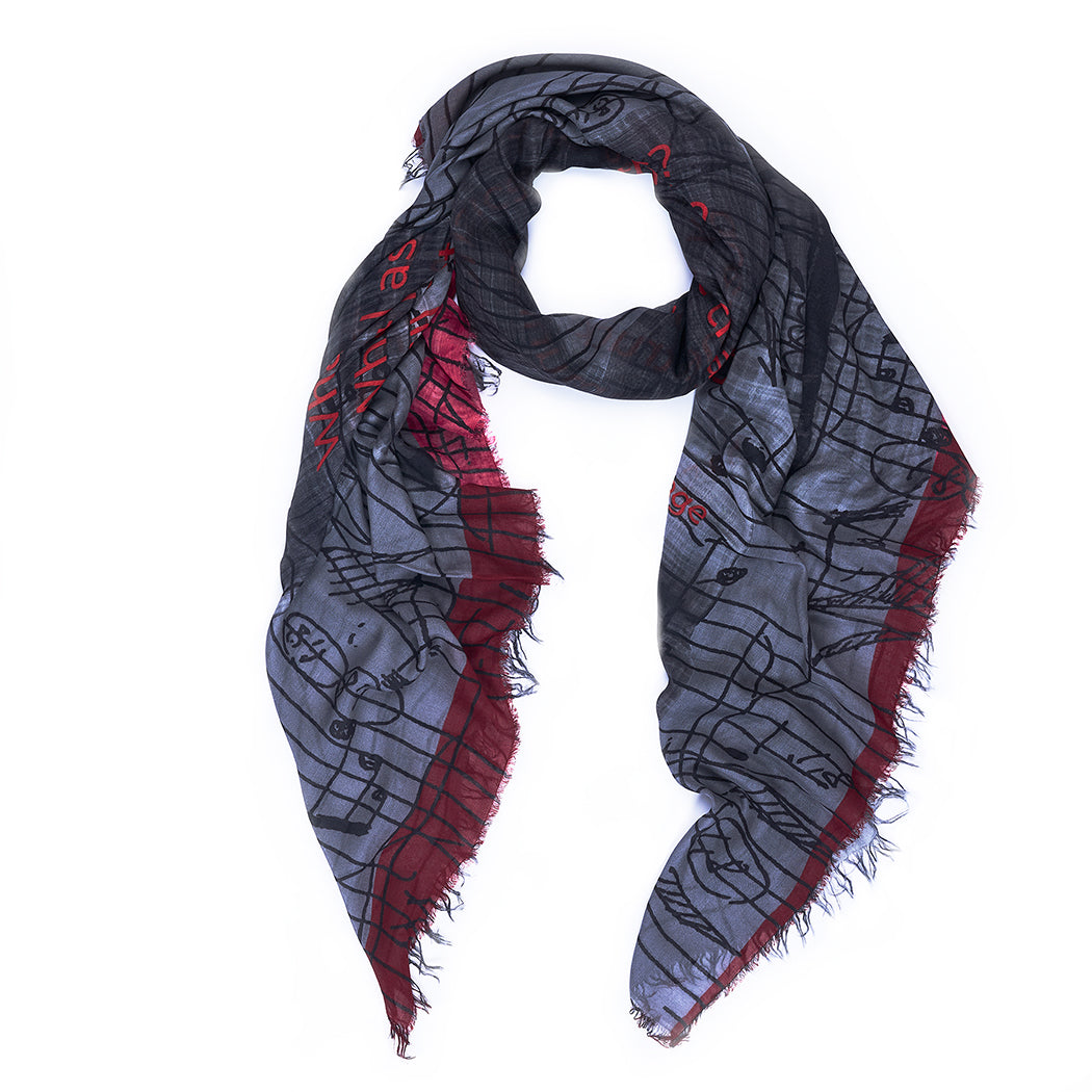 The SUZI ROHER "John Cage" scarf is a lightweight, rectangular accessory in gray and burgundy, featuring frayed edges and abstract line and note motifs with red lettering—ideal for artistic style enthusiasts.
