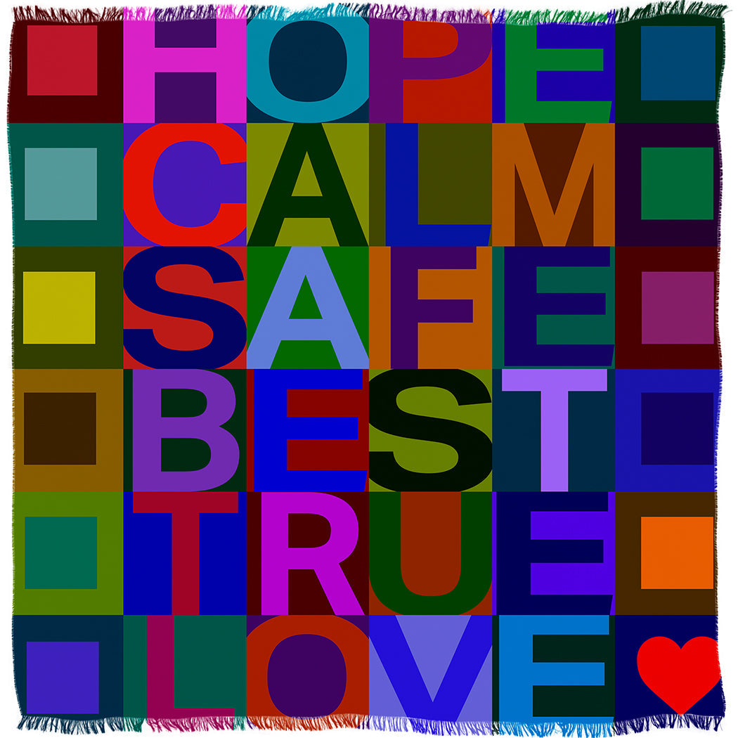 The TRUE quilt by SUZI ROHER features bold, multicolored squares with uplifting words and a red heart in the corner, spreading warmth and encouragement like a positive message scarf.