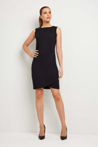 The Best Travel Dress. Woman Showing the Front Profile of a Johanna Dress in Black.