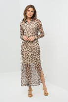 Front view sheer cheetah-print button-down dress featuring a classic collar, long sleeves, and a side slit for added movement.