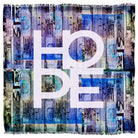 The SUZI ROHER "Hungry for Hope Blues" tapestry showcases the word HOPE in bold white letters on a blue and purple striped, abstract background, radiating optimism.