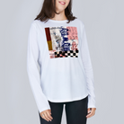 A woman wearing The Catherine long-sleeve crew neck tee by SUZI ROHER, featuring a colorful abstract graphic inspired by Frank Sinatra’s "My Way" with patterns, text, and checkered elements, stands against a plain gray background.
