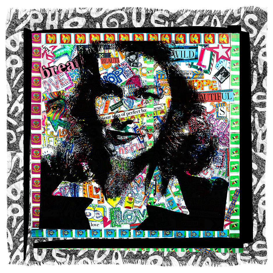 The Perfect Happiness scarf by SUZI ROHER features a vibrant collage portrait with colorful words like “beauty,” “love,” and “hope,” framed by a black-and-white patterned border with repeated text.