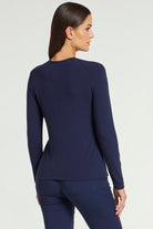 The Best Travel Top. Woman Showing the Back Profile of a Tony Pima Cotton Long-Sleeve Top in Navy