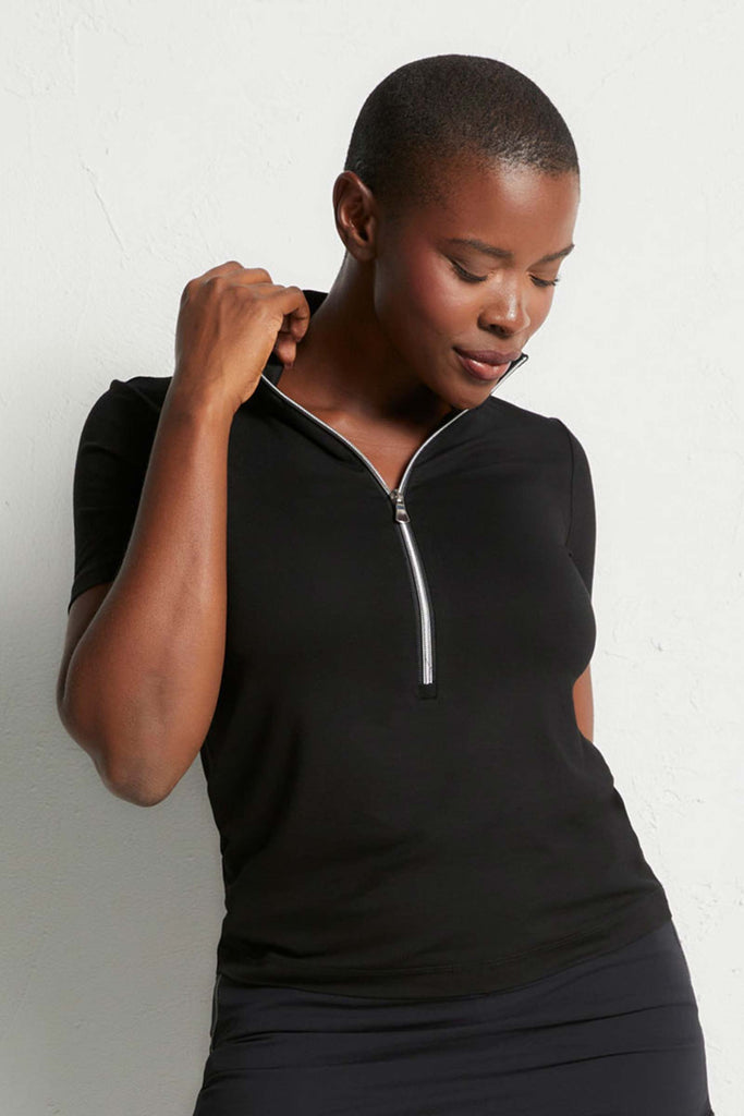 The Best Travel Top. Woman Showing the Front Profile of a Serena Top in Black ||